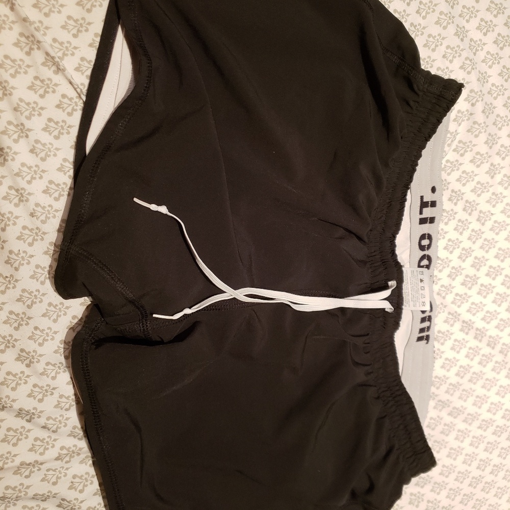 SOLD!!Black shirts with spandex attached . Dri fit